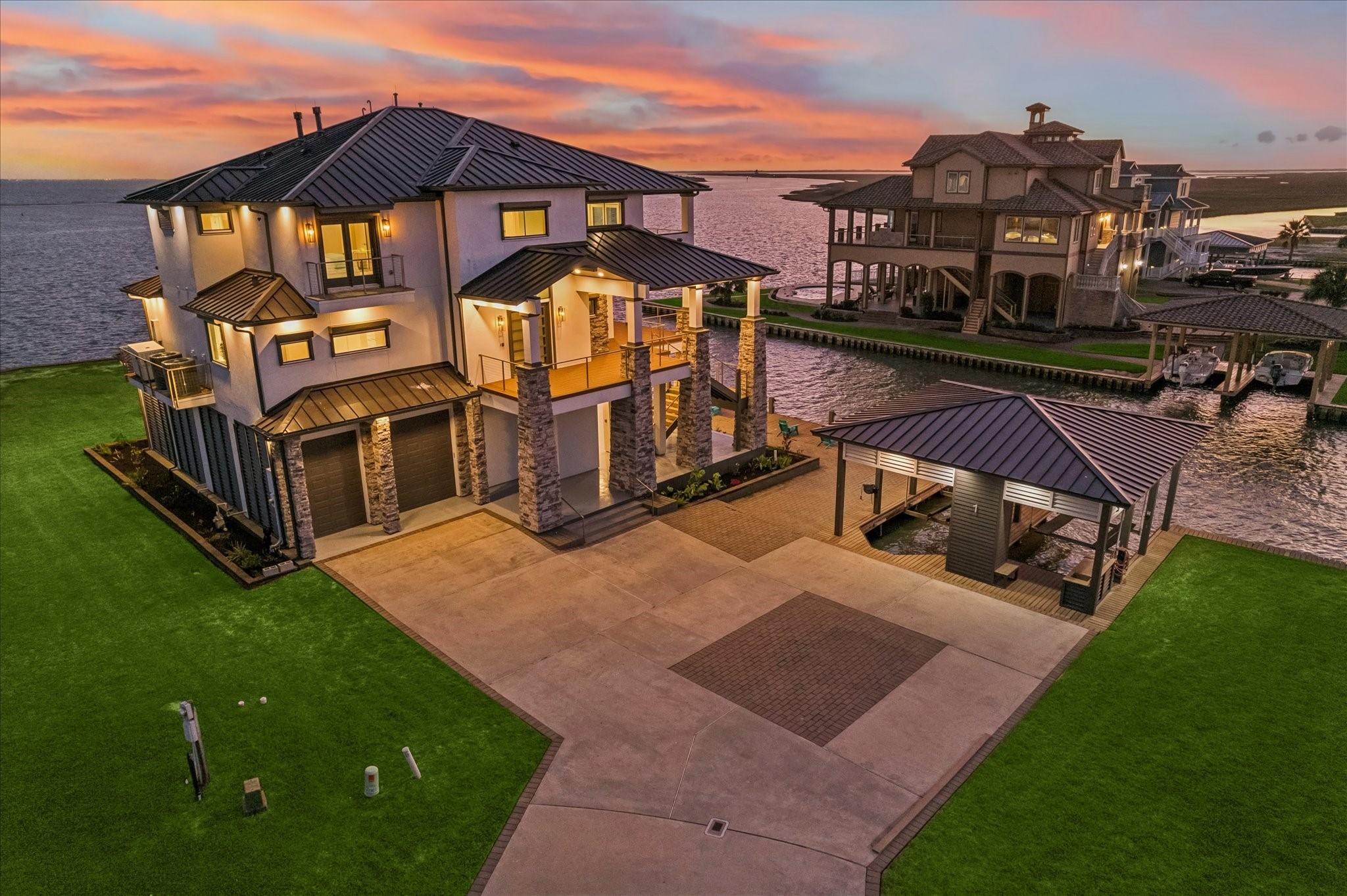 Image 1: Designed for boating enthusiasts, the property off