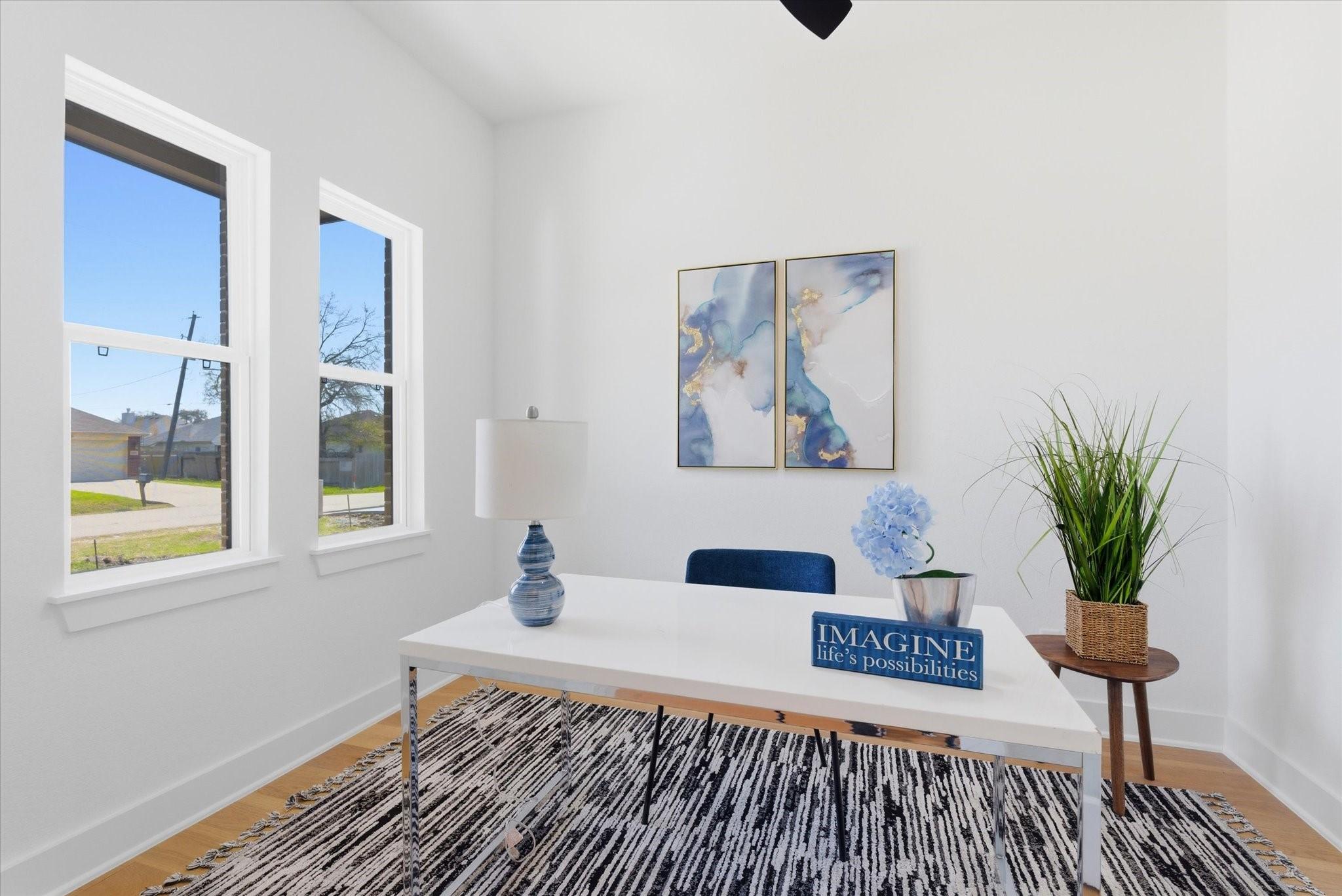 Image 3: Dedicated home office featuring a ceiling fan and