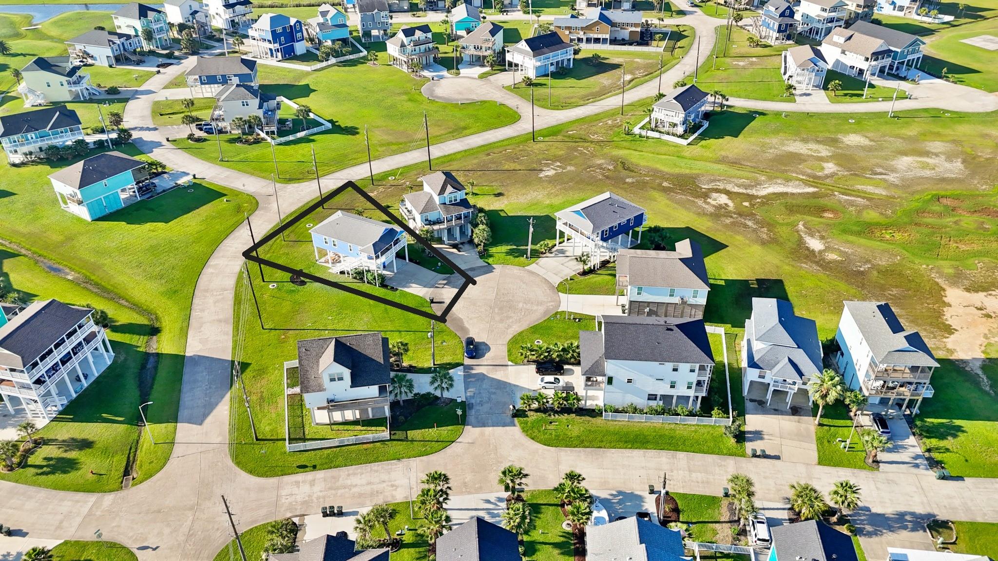 Image 4: A charming coastal neighborhood with beautiful hom