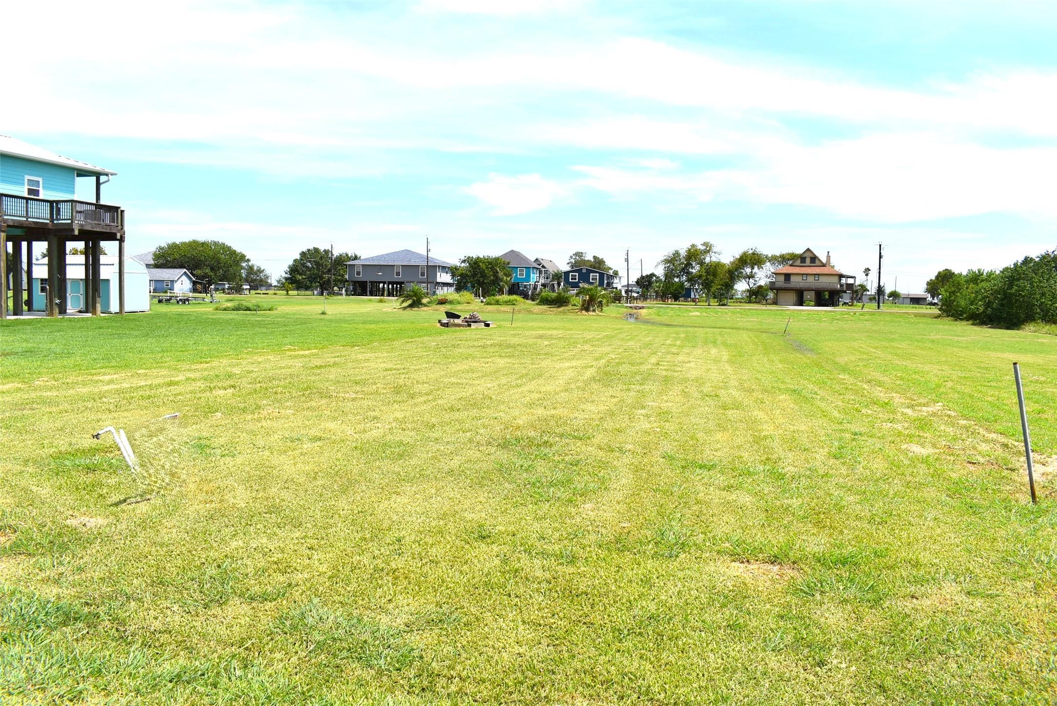 Image 1: Nice long lot and extra portion is behind it
