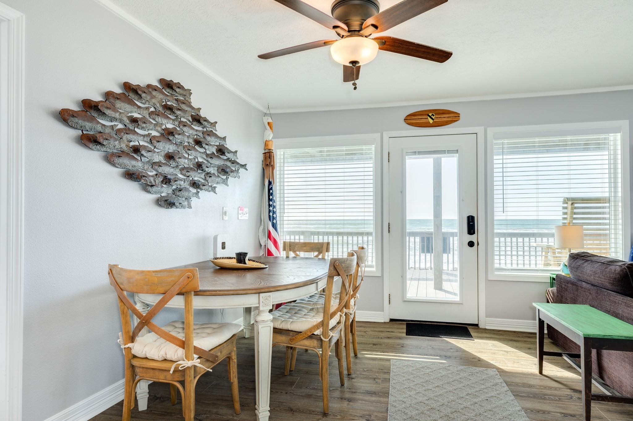 Image 4: Dining Area (Deck Access) &ndash; Dining space with dire