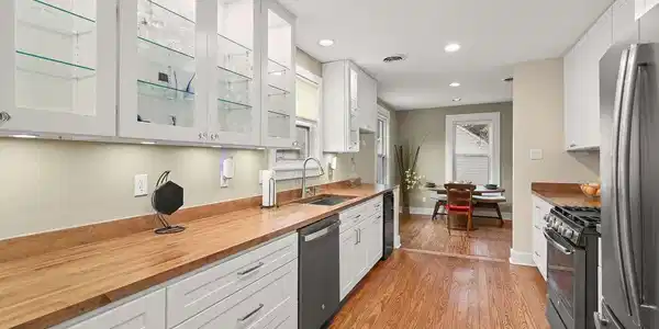 Image 3: Spacious Kitchen Featuring Beautiful Wood Butcher-