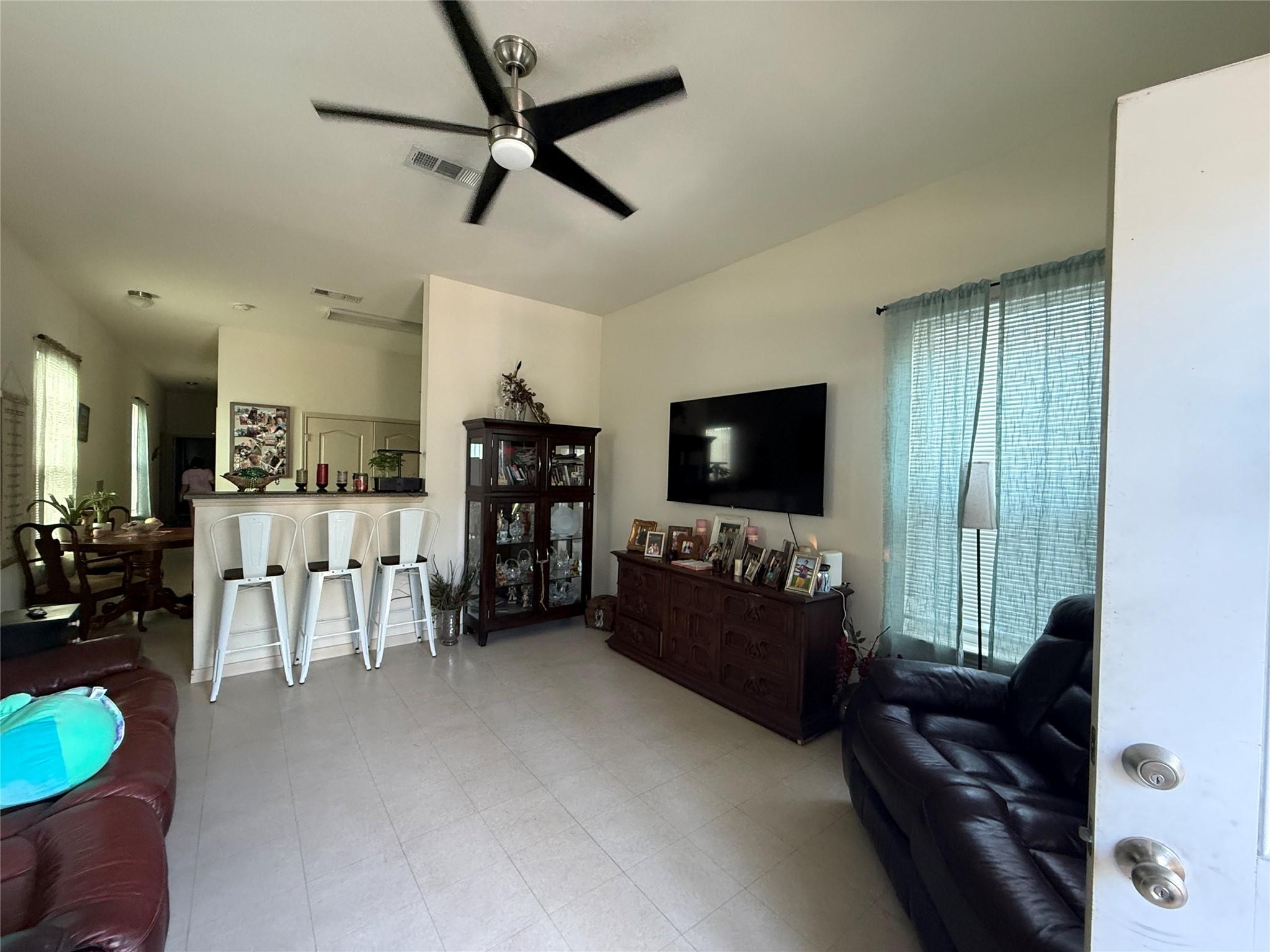 Image 2: The living room greets you upon entering.