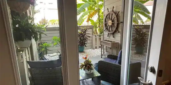 Image 2: French doors adjacent to living room, create the p