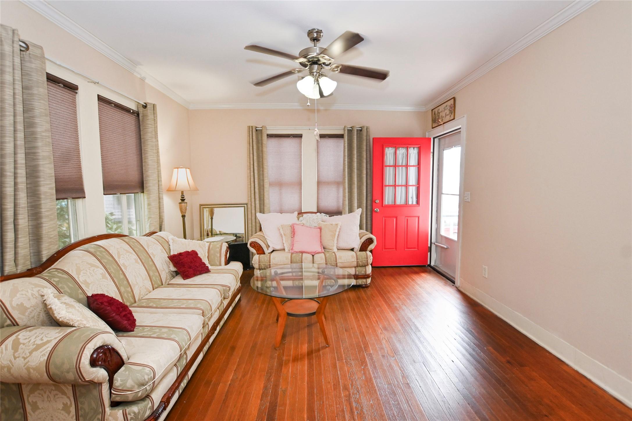 Image 3: Enter the home to a welcoming family room where or