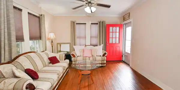 Image 3: Enter the home to a welcoming family room where or