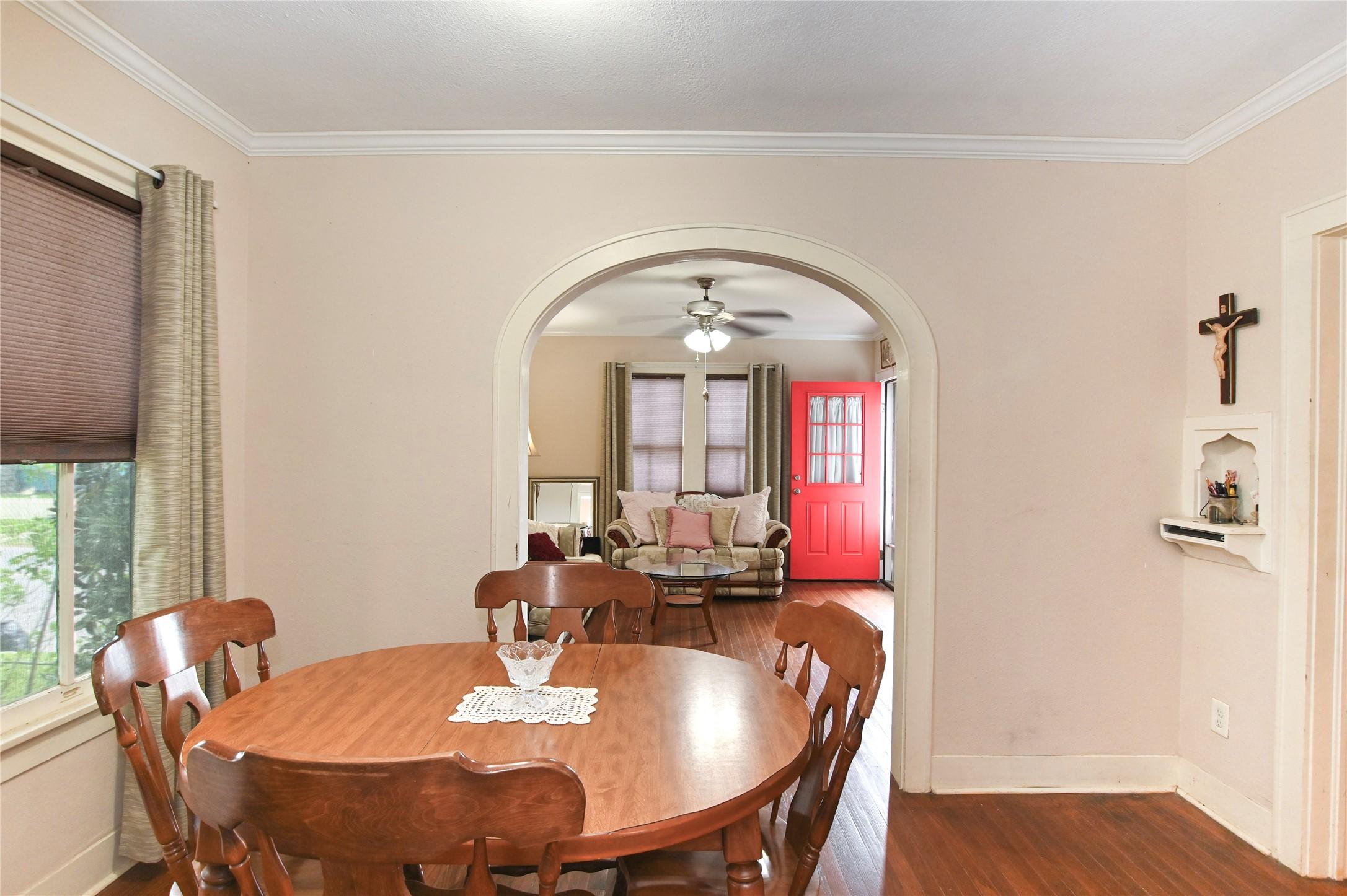 Image 4: Formal dining nestled in the middle of the home, c