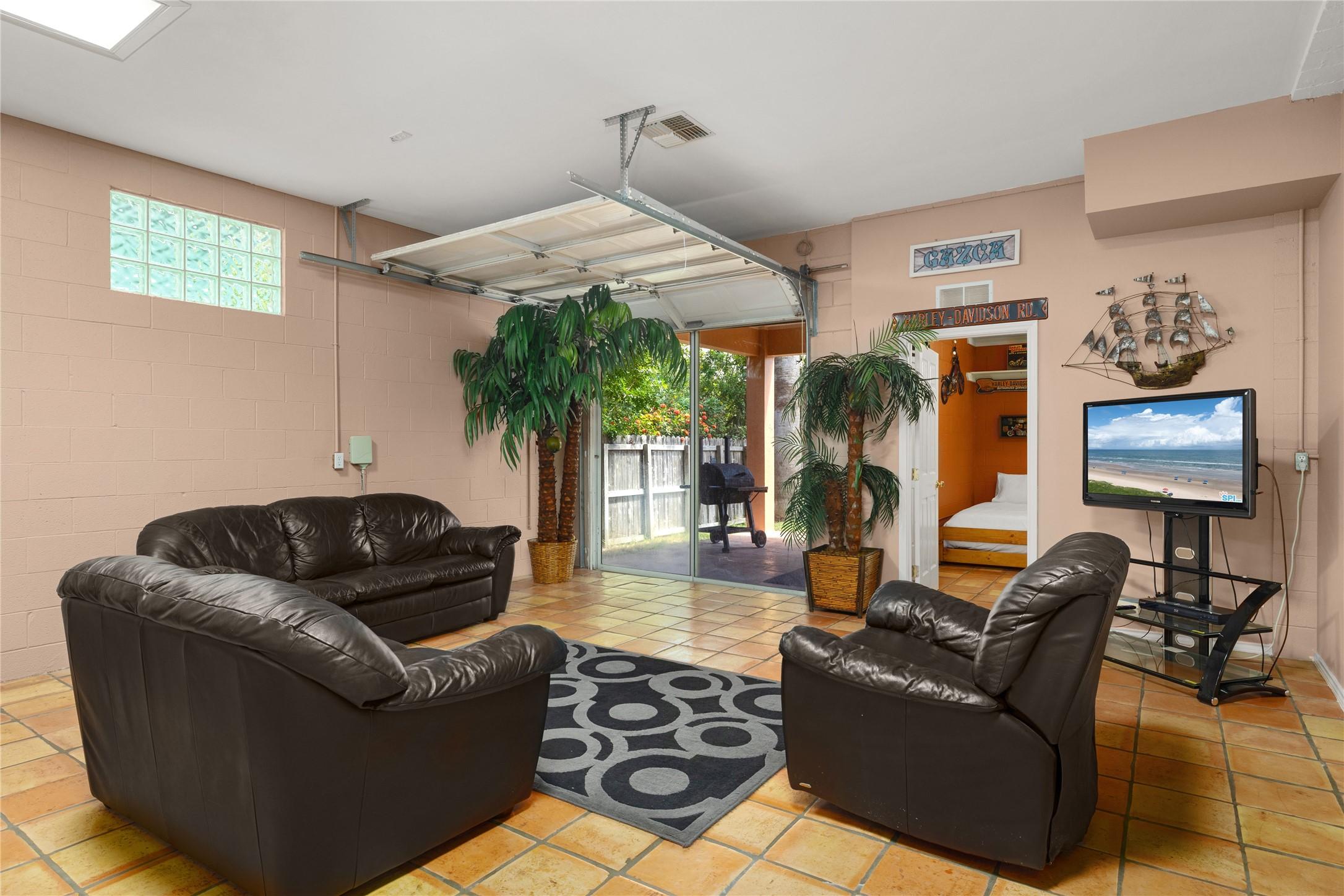 Image 3: This space is a versatile recreational room with a