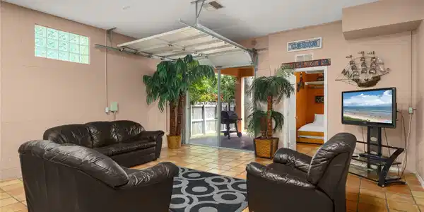 Image 3: This space is a versatile recreational room with a