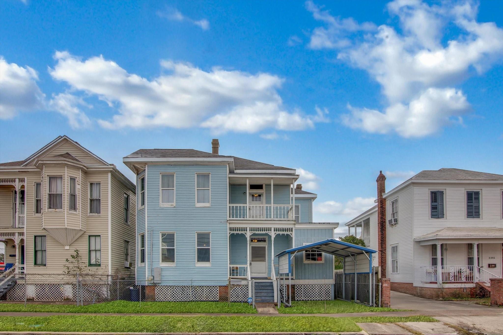 Image 2: Front of home-view from the street.