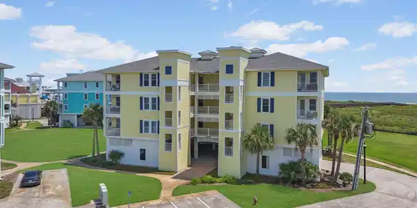 Image 2: The building features coastal architecture with ea
