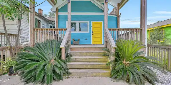 Image 3: The front of the home offers direct access to the