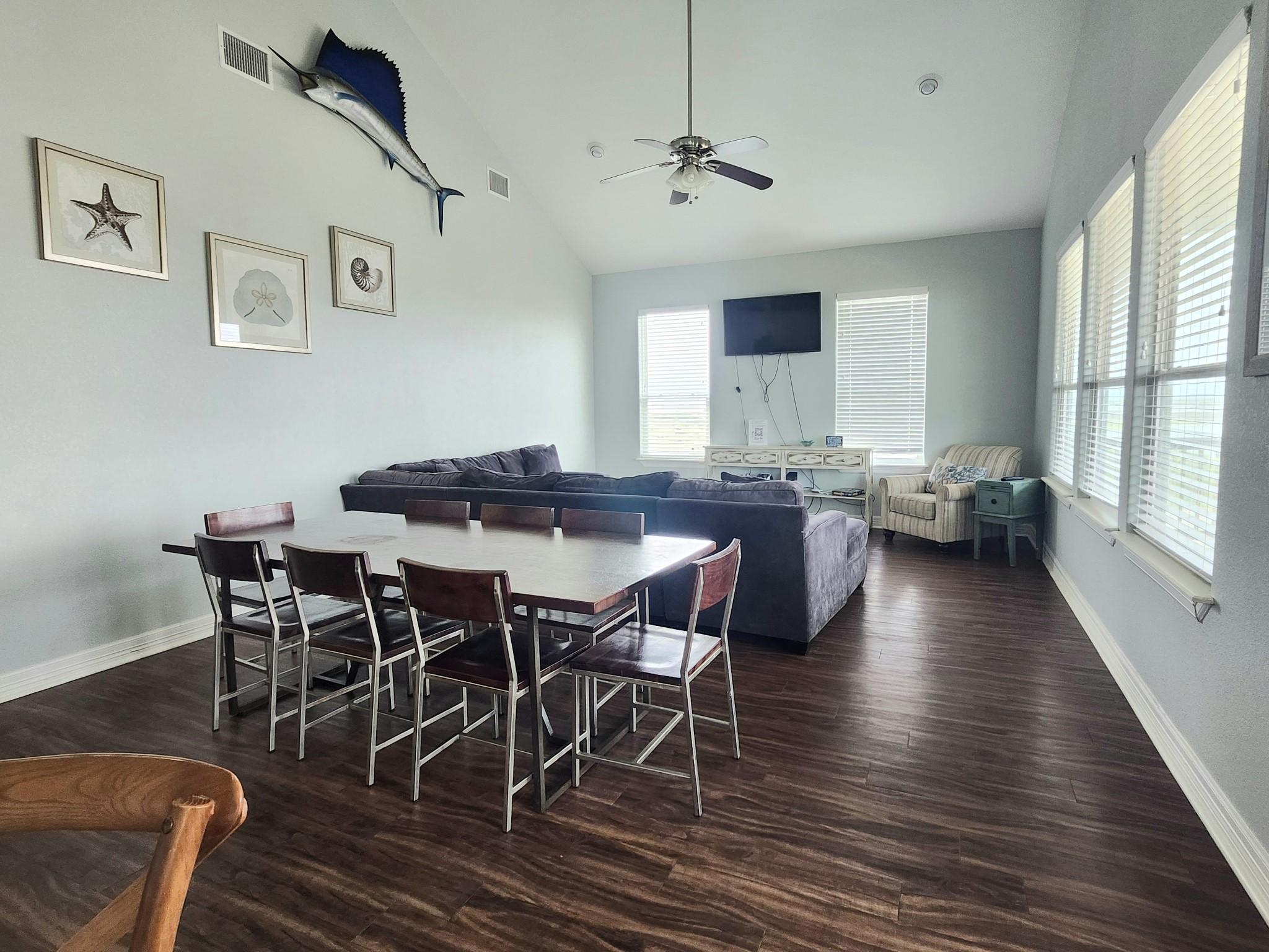 Image 4: Walk in to the open living, dining, kitchen area