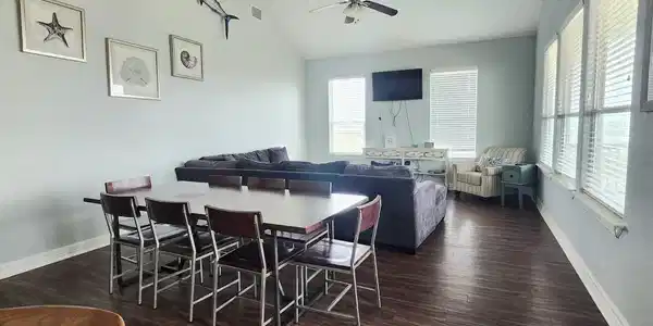 Image 4: Walk in to the open living, dining, kitchen area