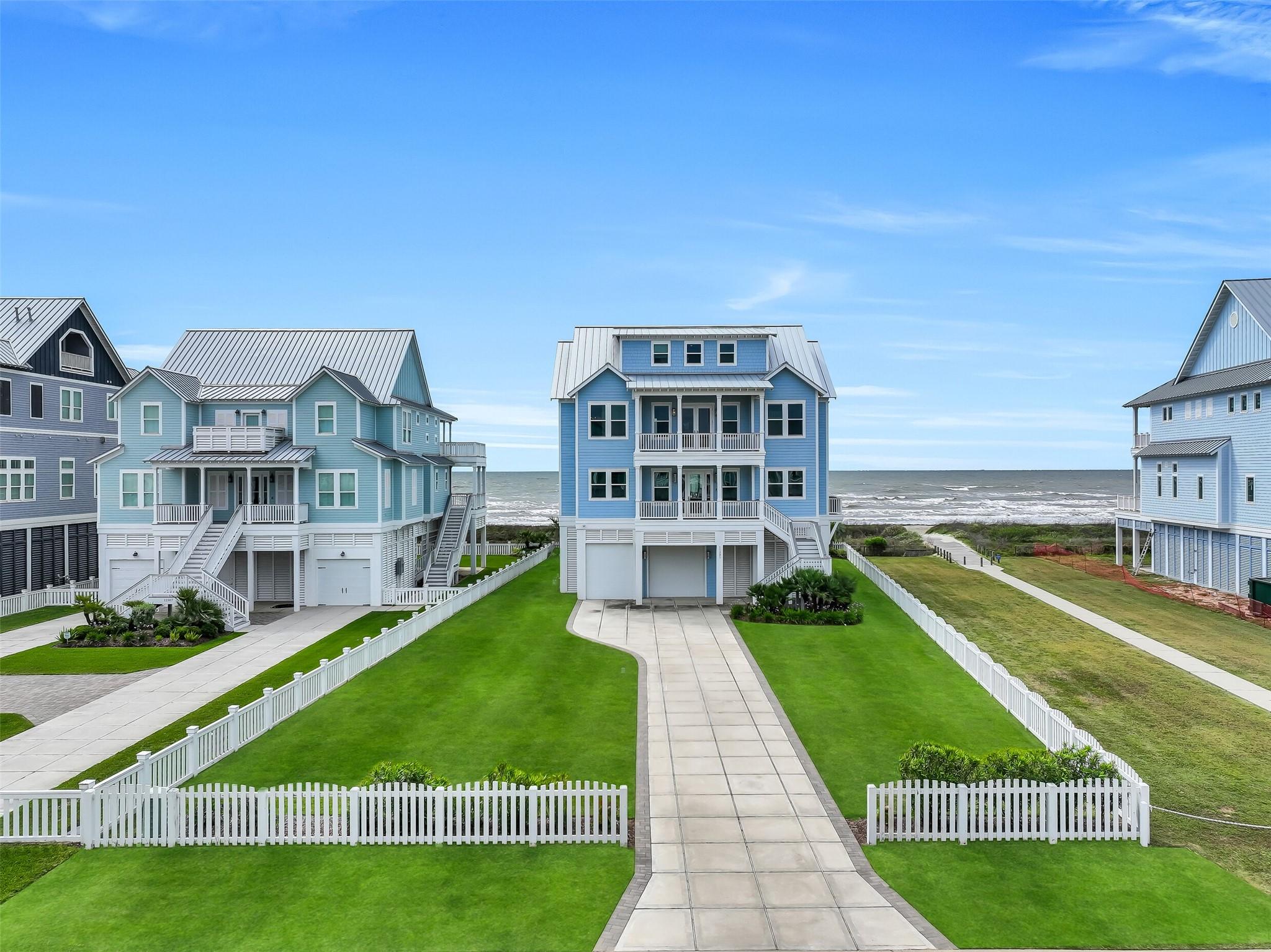 Image 2: This beachfront home boasts multiple north- and so