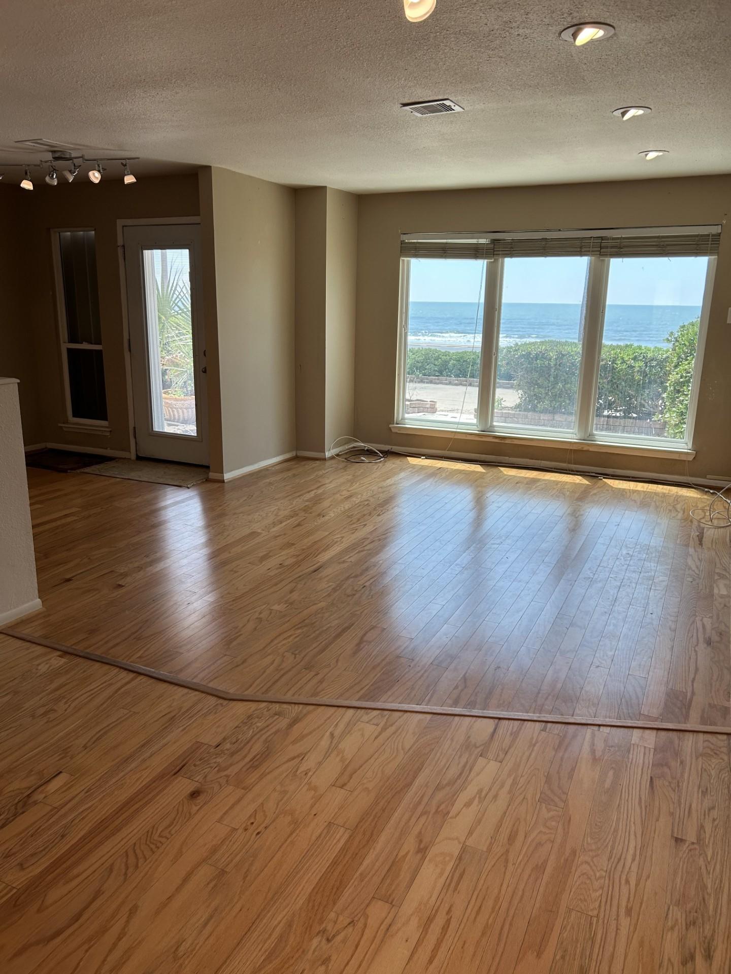 Image 4: Looking through the living room with the front doo