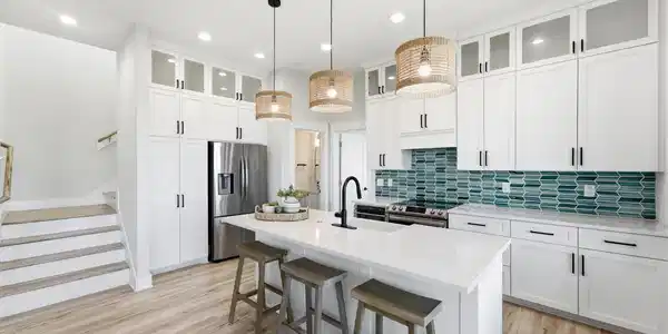 Image 2: A kitchen made for easy meal prep and gathering wi