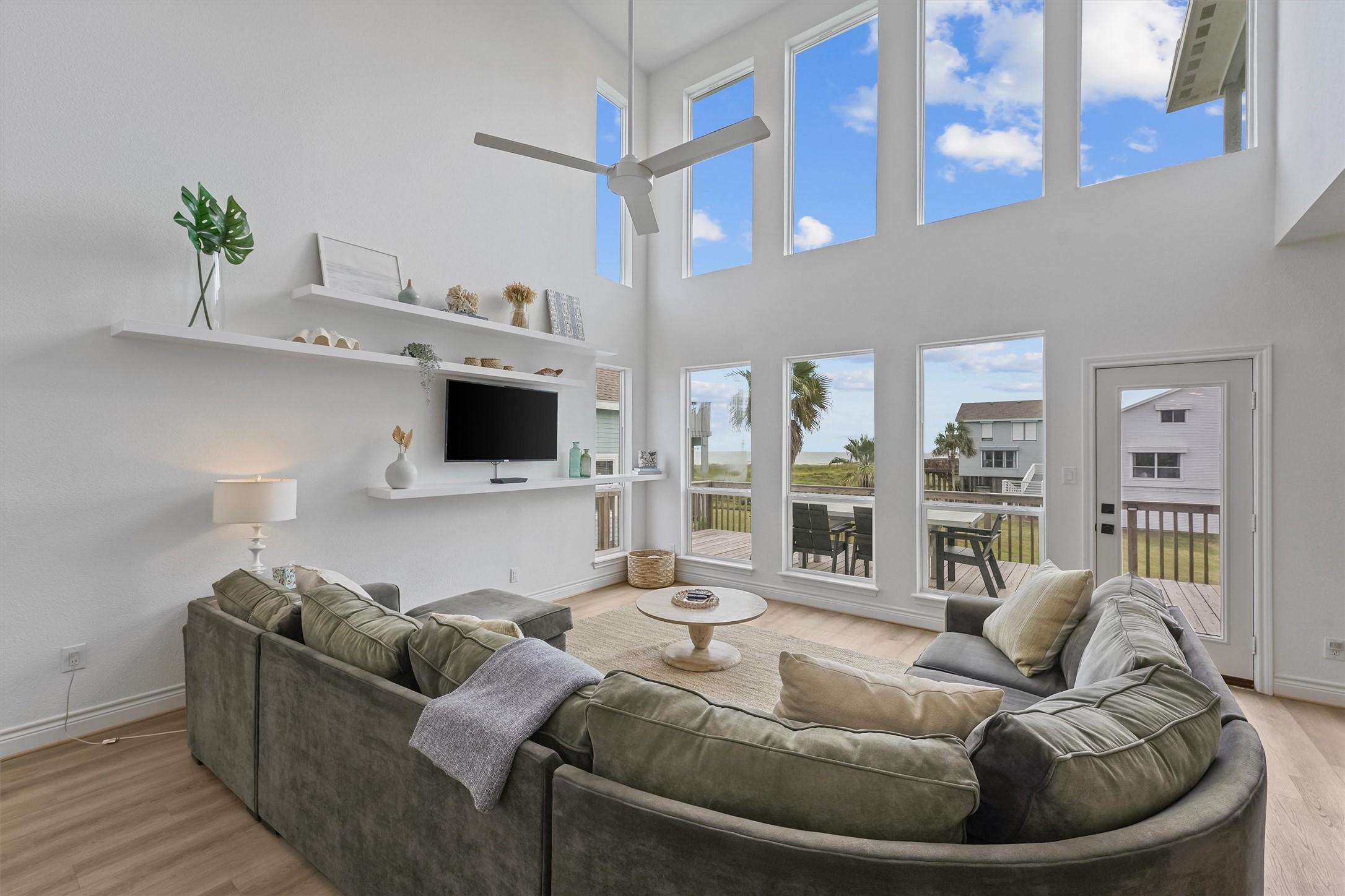 Image 4: You are met with double height ceilings as you fir