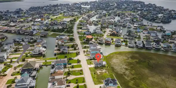 Image 2: Wide aerial view identifying the property within T