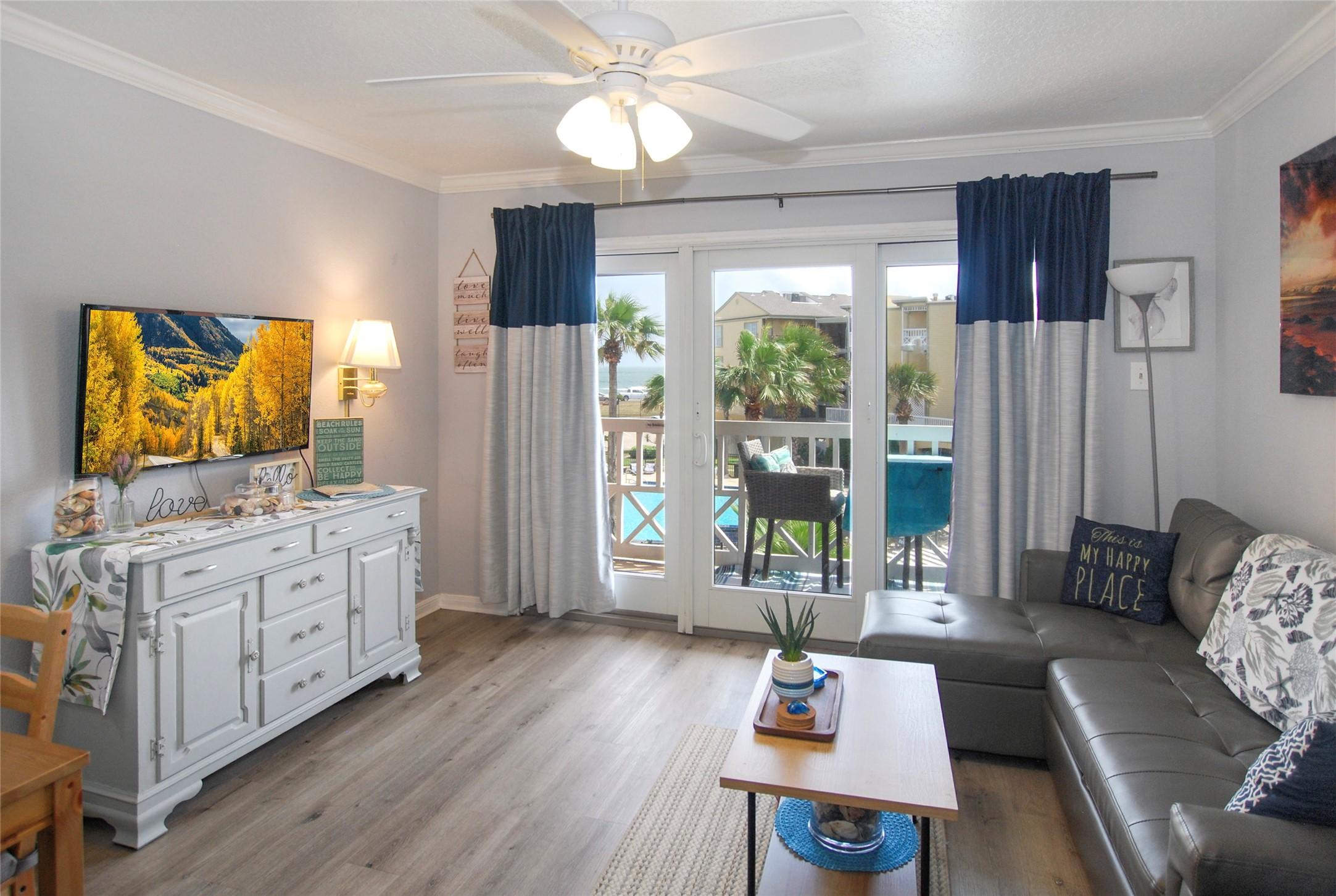 Image 3: Access to private balcony from living space.