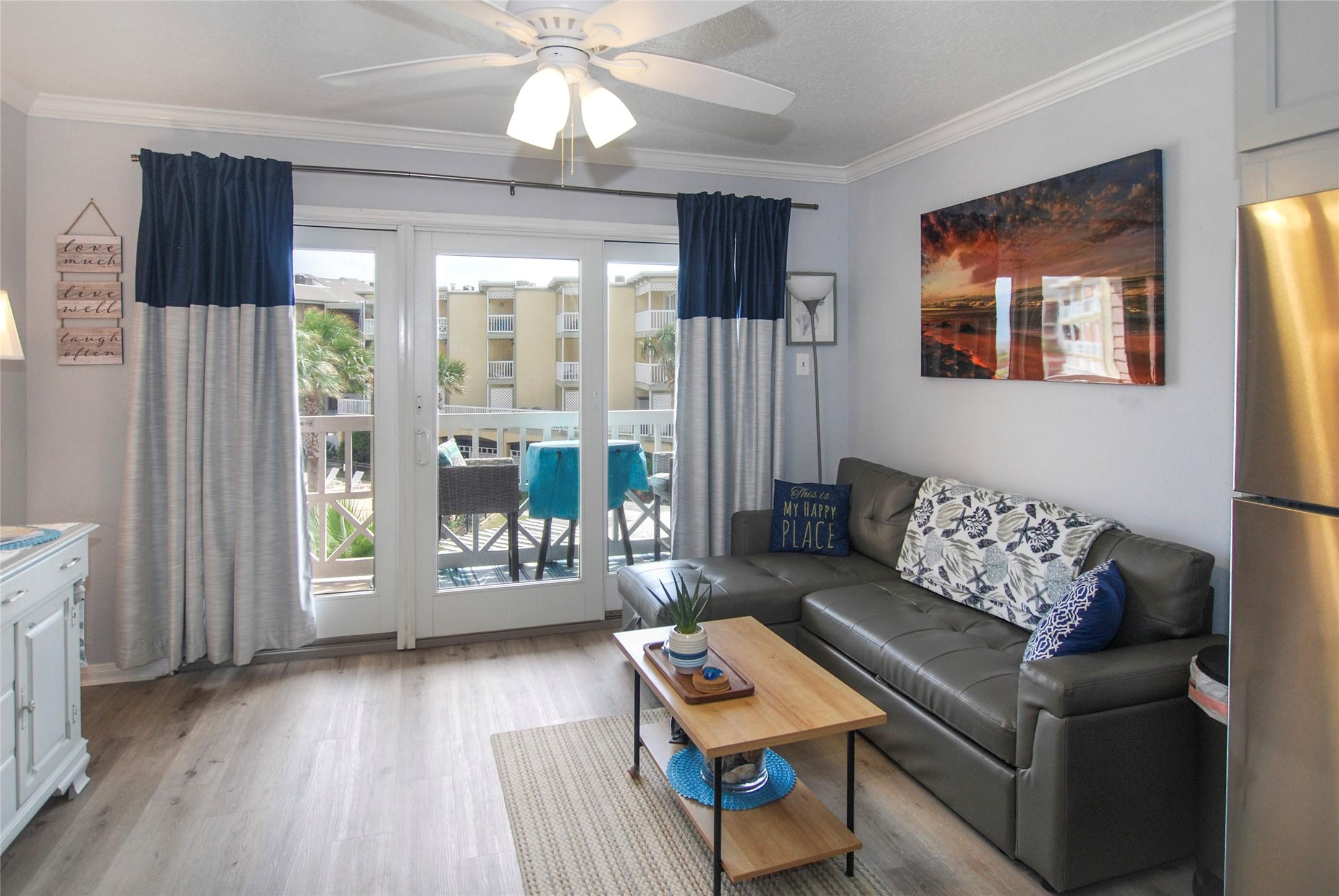 Image 4: Luxury vinyl plank flooring makes sandy feet easie