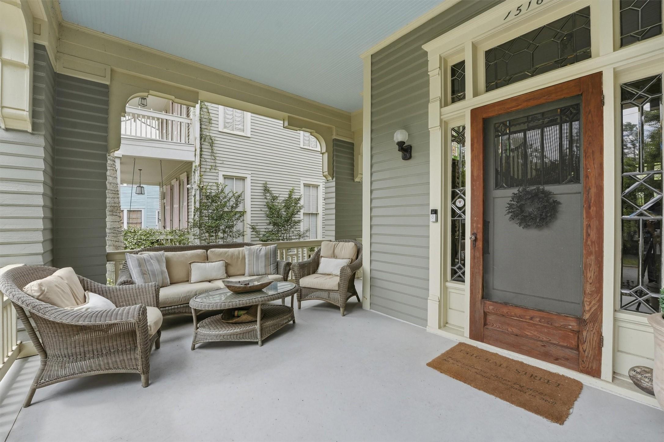 Image 3: Spacious covered front porch offering the perfect