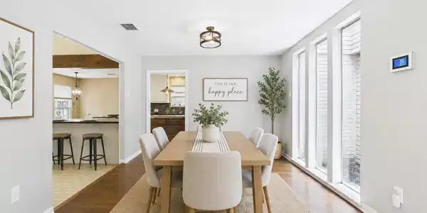 Image 4: Virtually staged dining room to show a different p