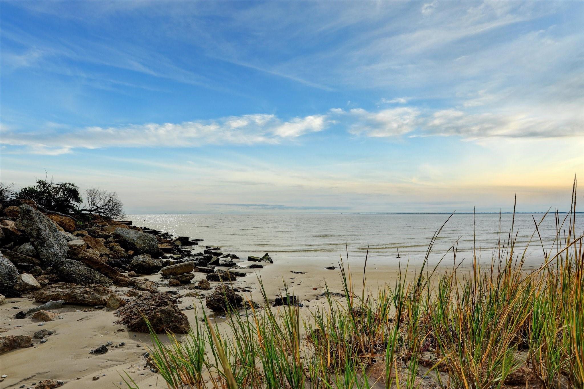 Image 2: From your private beach, watch the sun rise over t