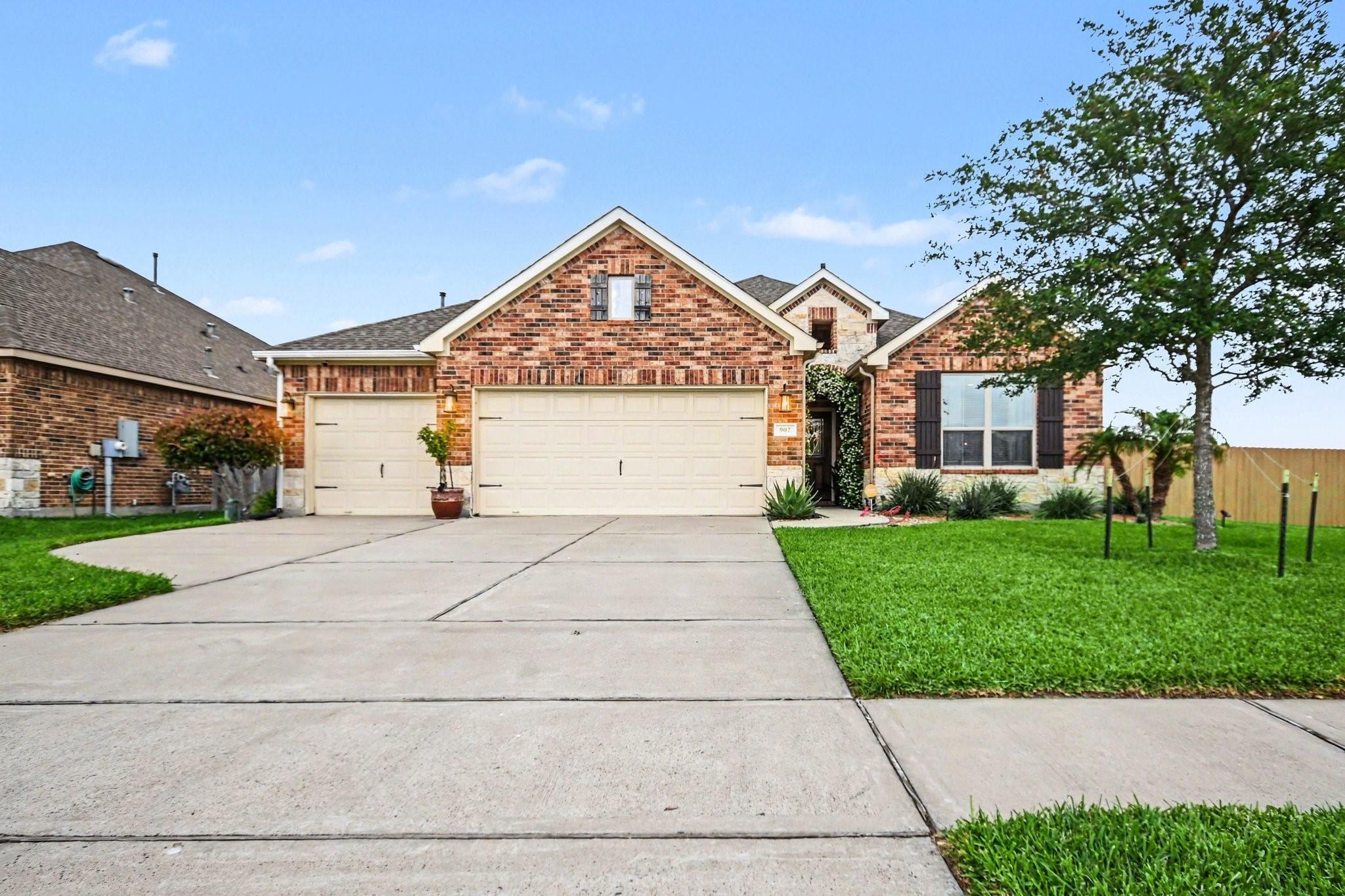 Image 3: This photo showcases a charming single-story brick