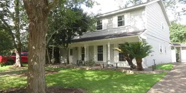 Image 2: another view of front of home
