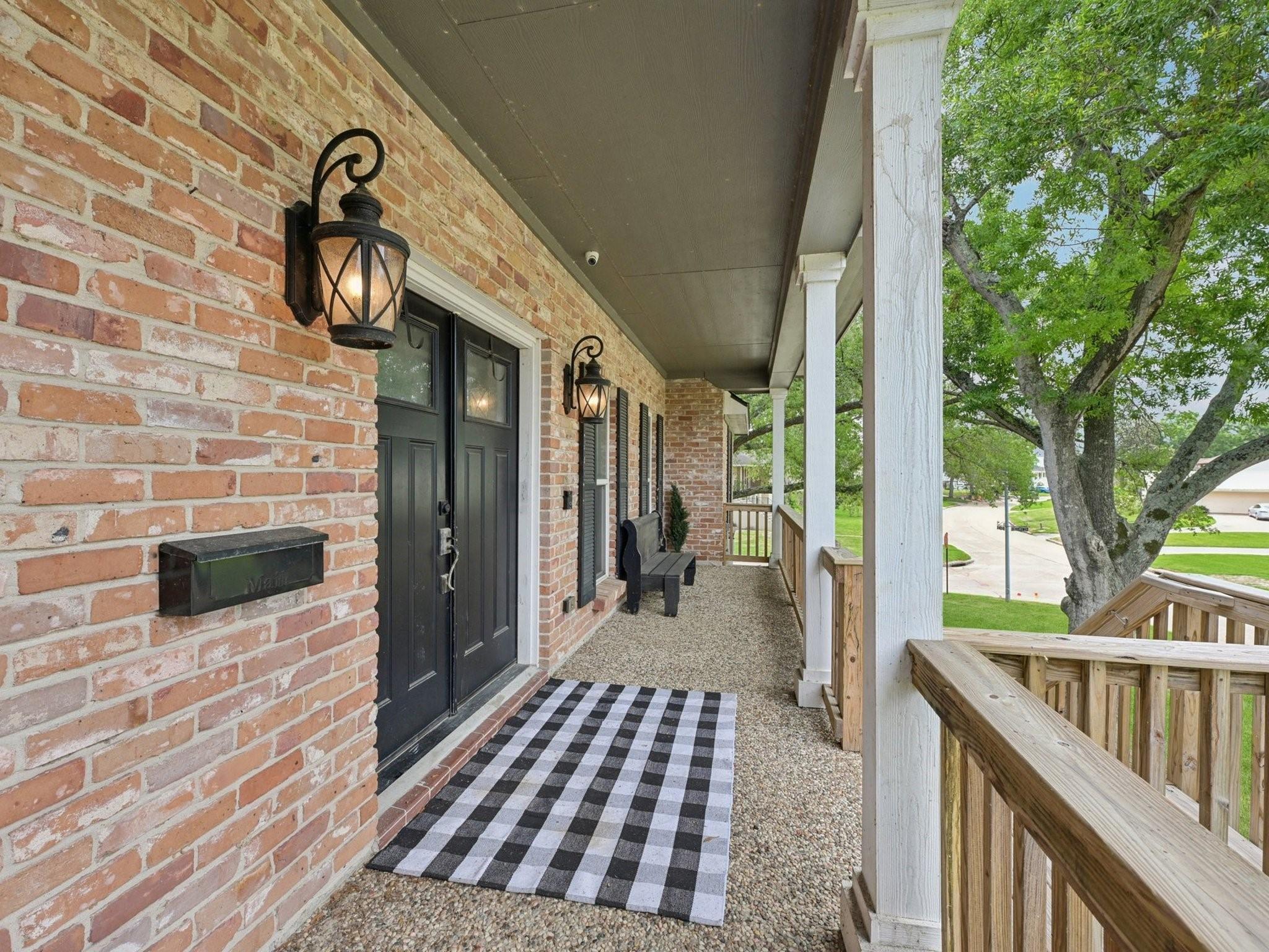 Image 3: A terrific covered porch will beckon you.