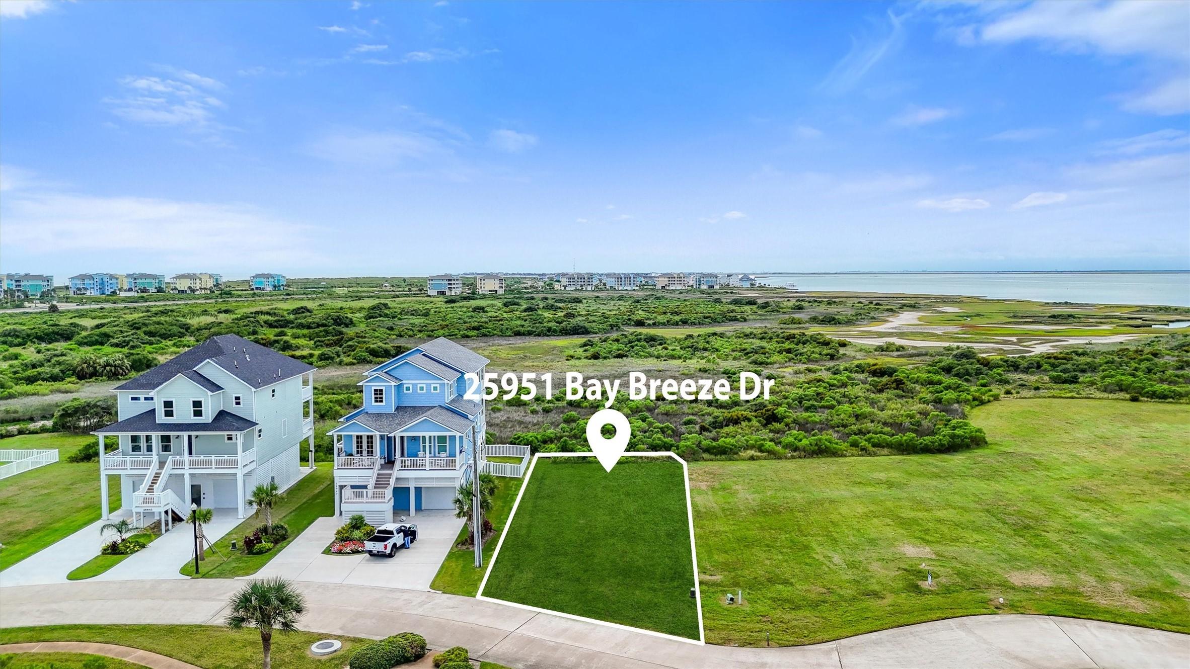 Image 3: Surrounded by beautiful homes
and open green spac