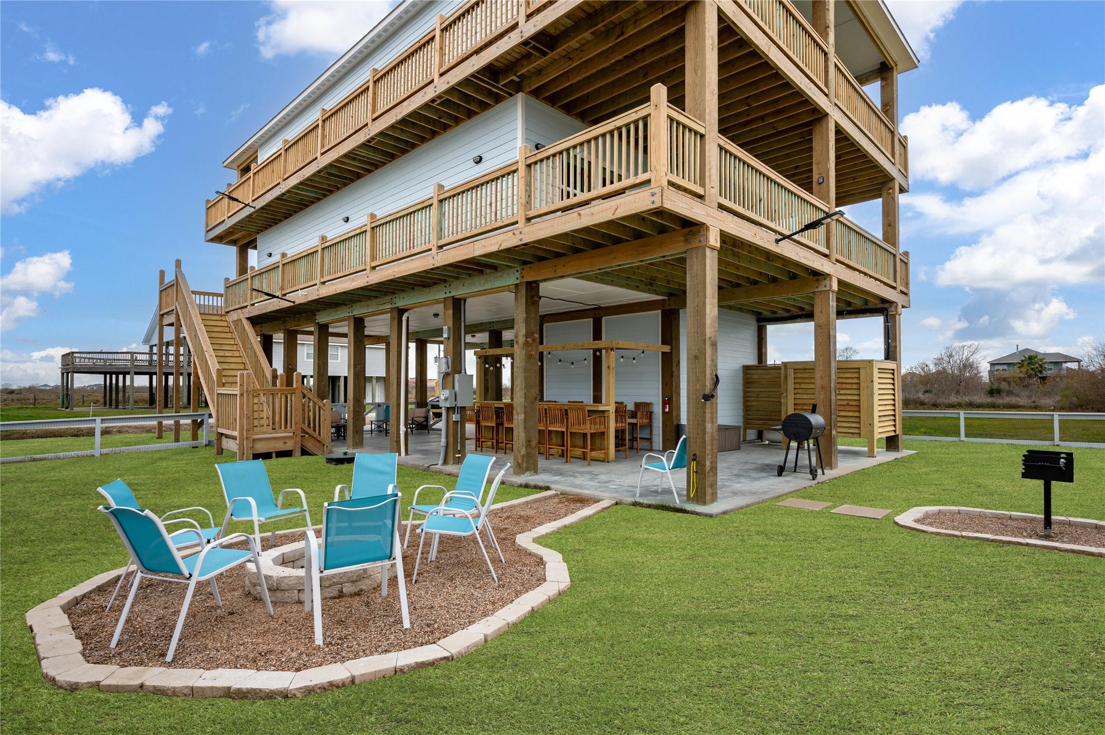 Image 3: Gather around the firepit, throw some burgers on t