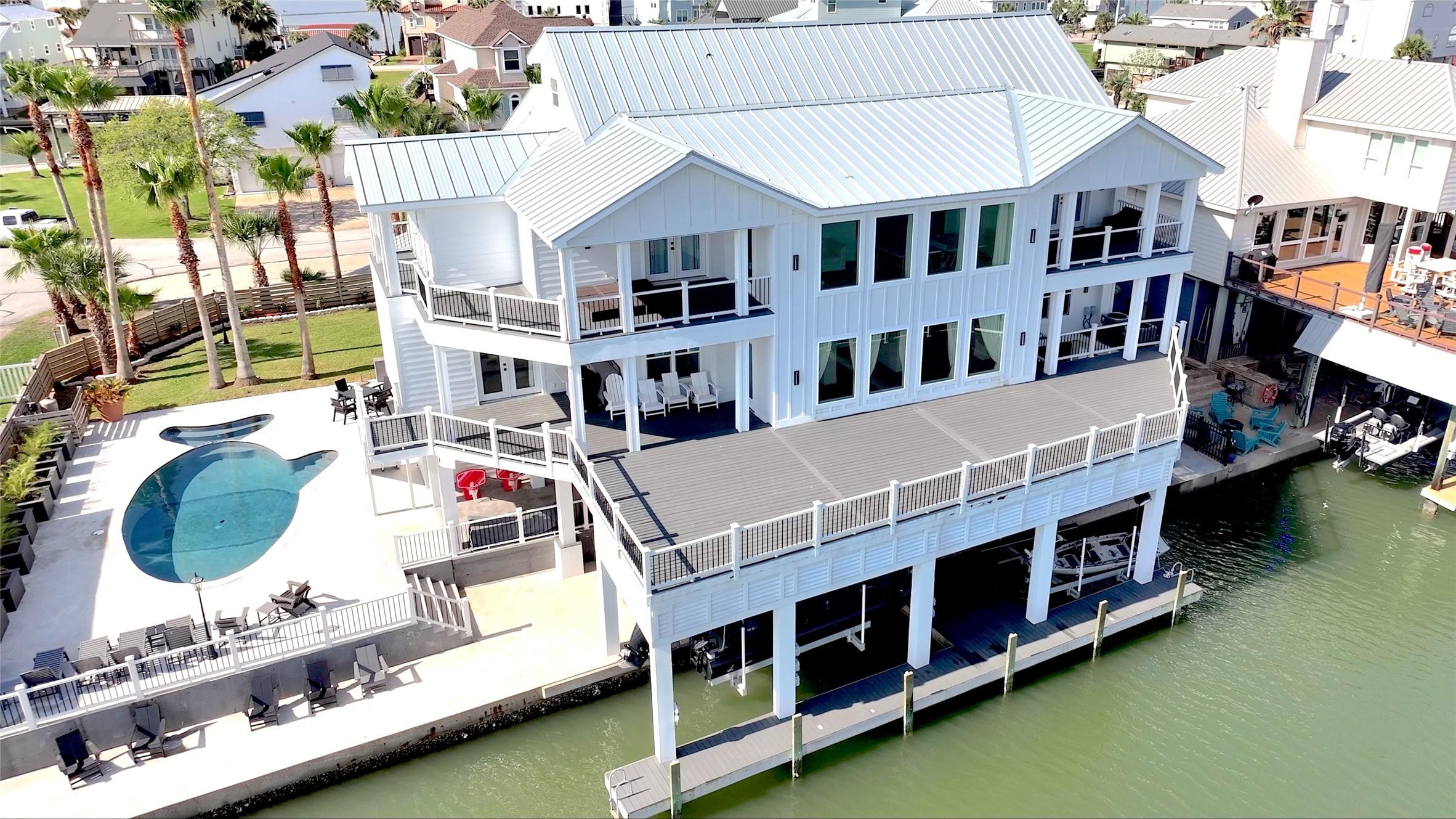 Image 2: From above, the home&rsquo;s exceptional placement along