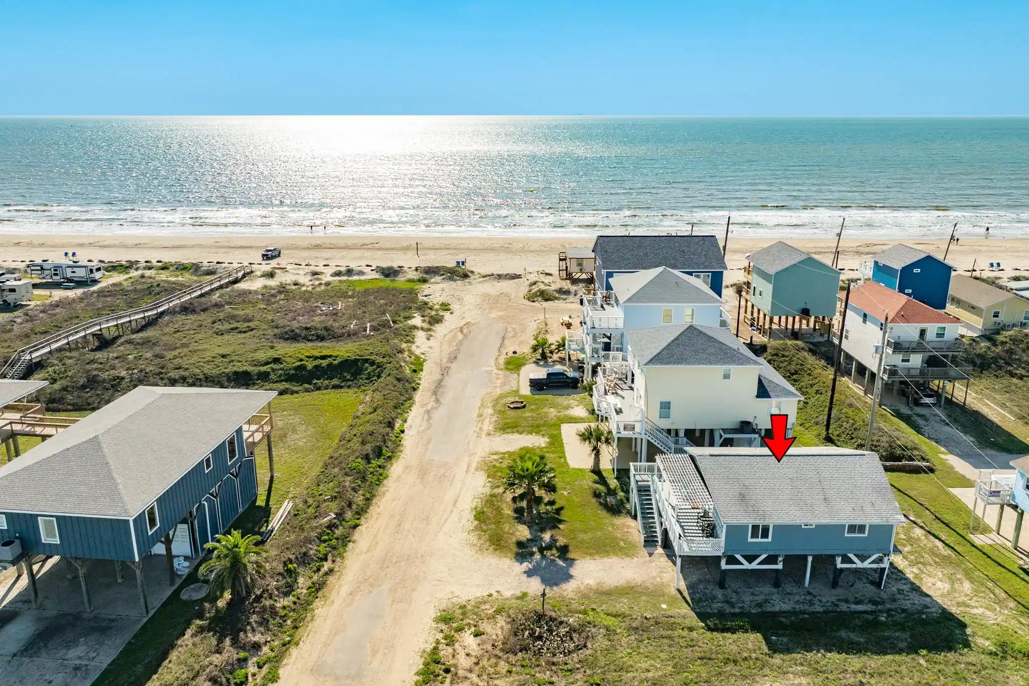 Image 1: Aerial View &ndash; Beach Access Nearby
Bird&rsquo;s-eye pers
