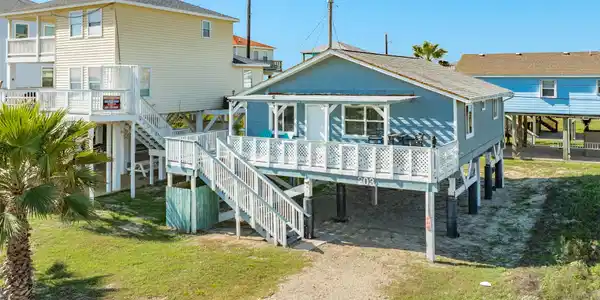 Image 2: Exterior &ndash; Front of Home
This charming raised bea