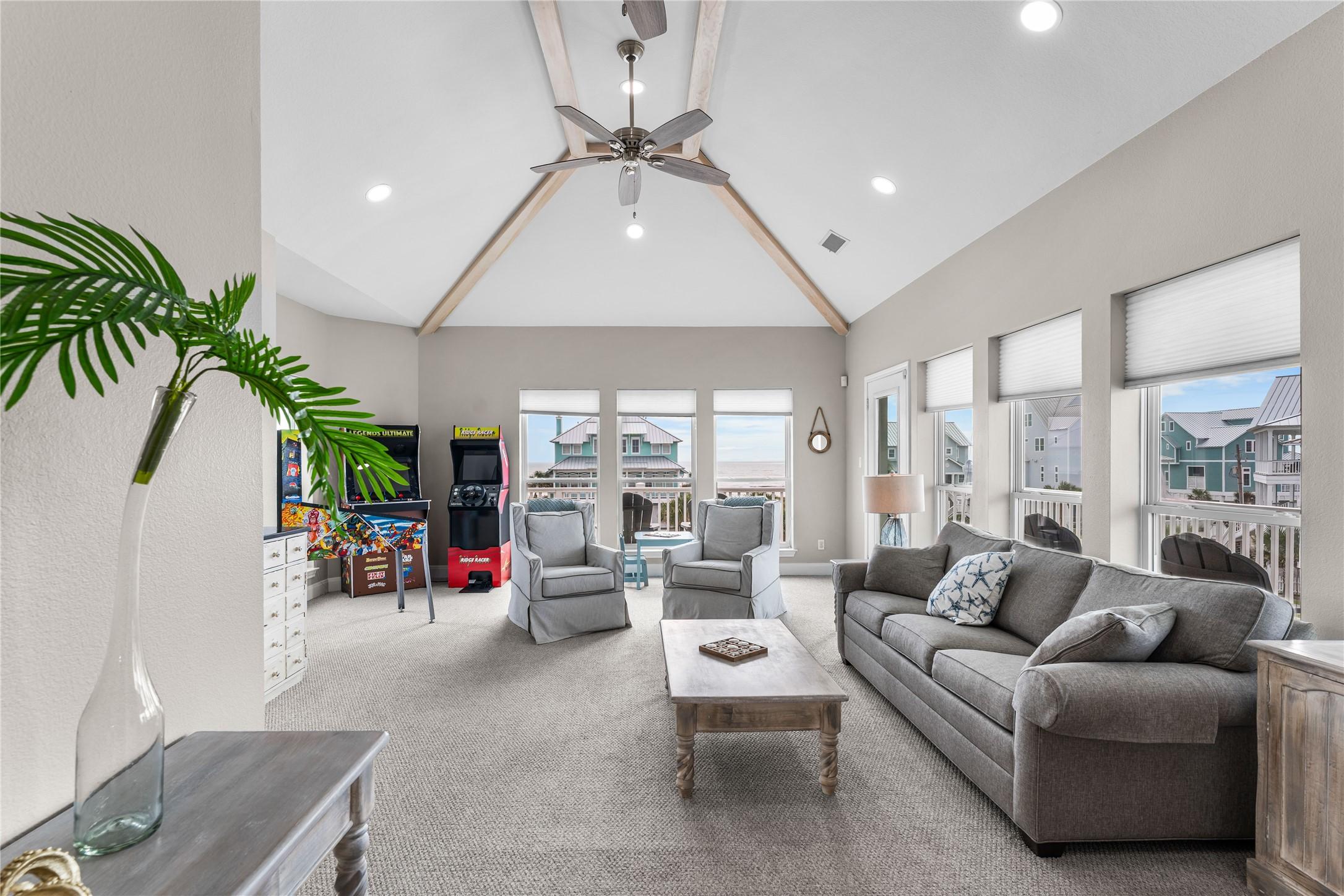 Image 4: Large game room with arcade games, TV, waterfront