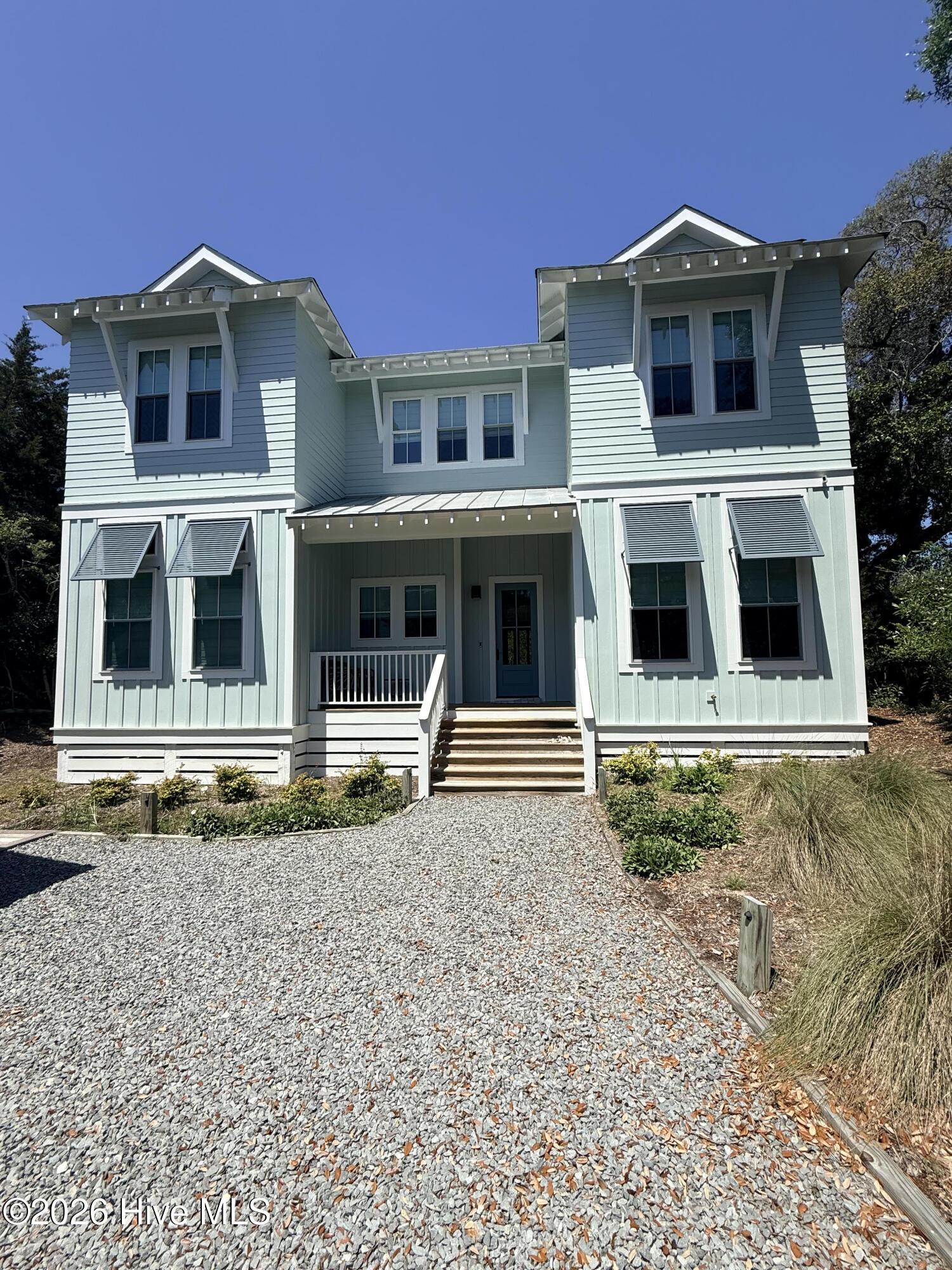 Image 1: front of house