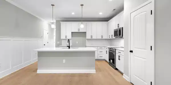 Image 3: Open Concept Kitchen and Living