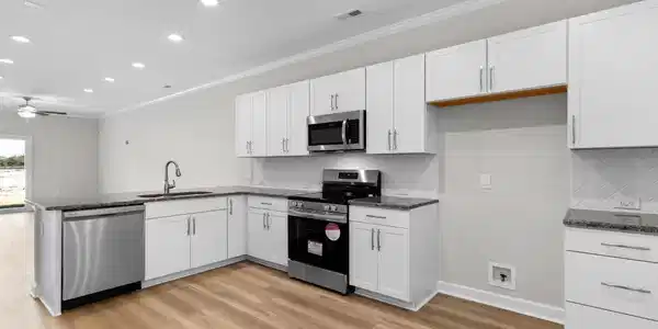 Image 3: Kitchen- Open Concept to Dining & Living