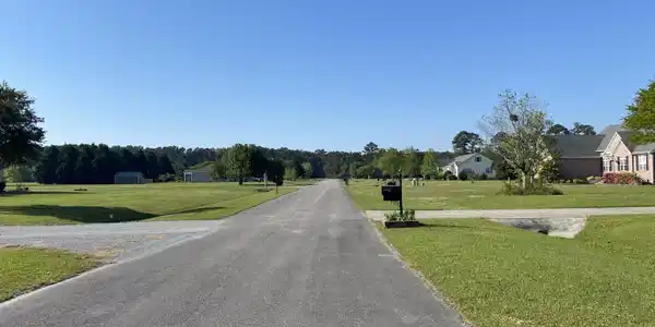 Image 4: View down street from lot