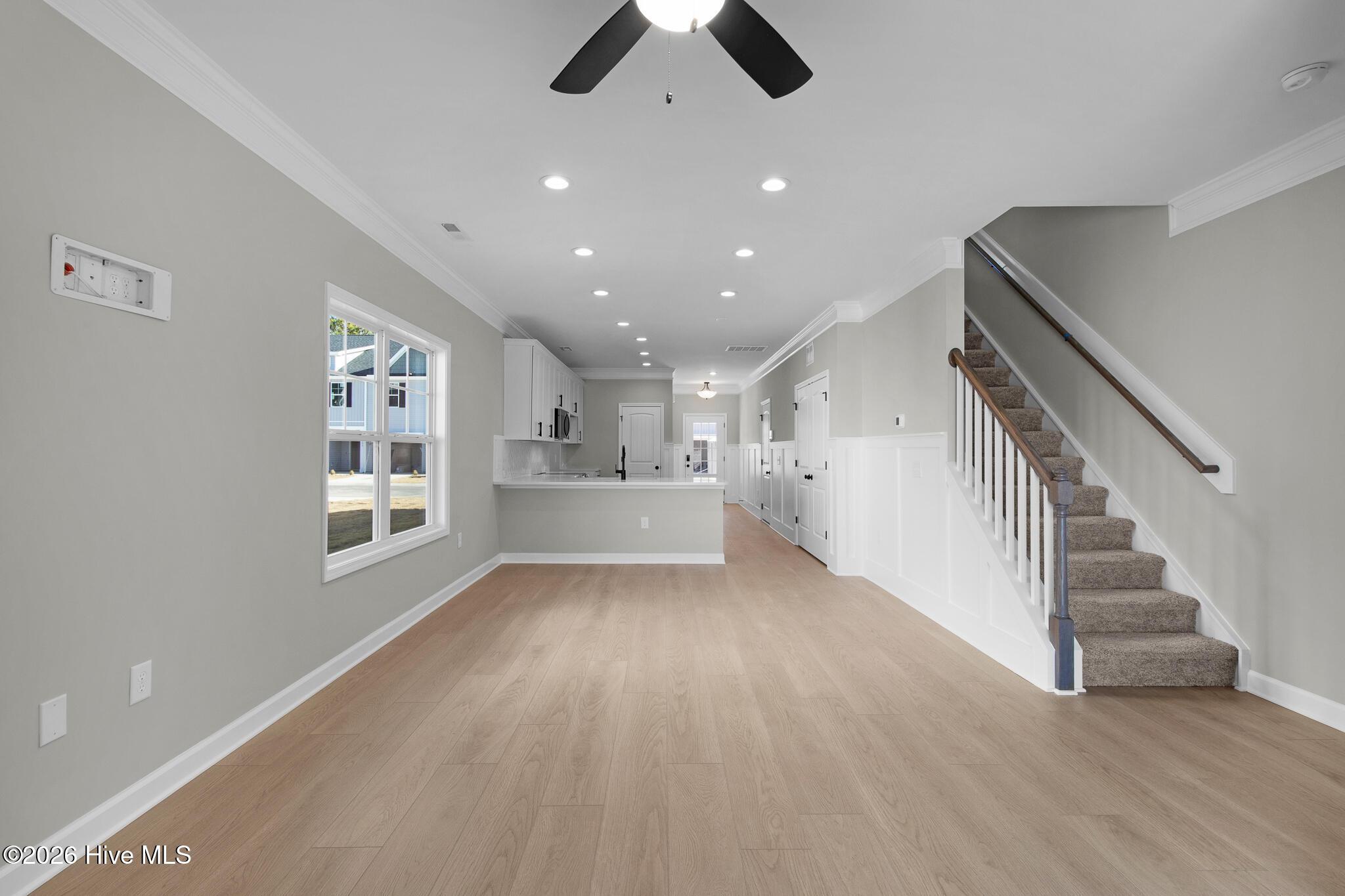 Image 4: Open Living Room and Dining Space