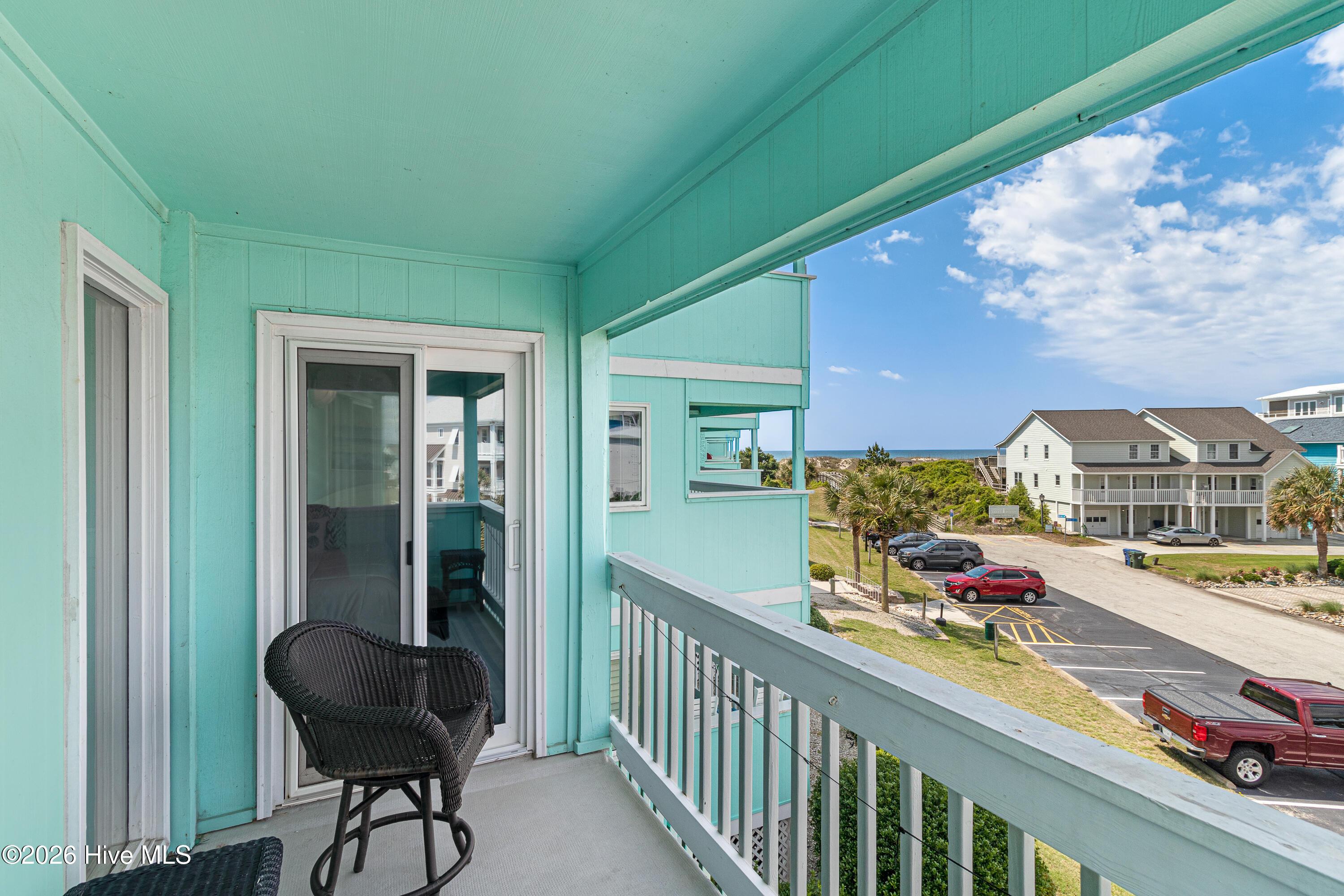 Image 3: Covered deck with ocean view