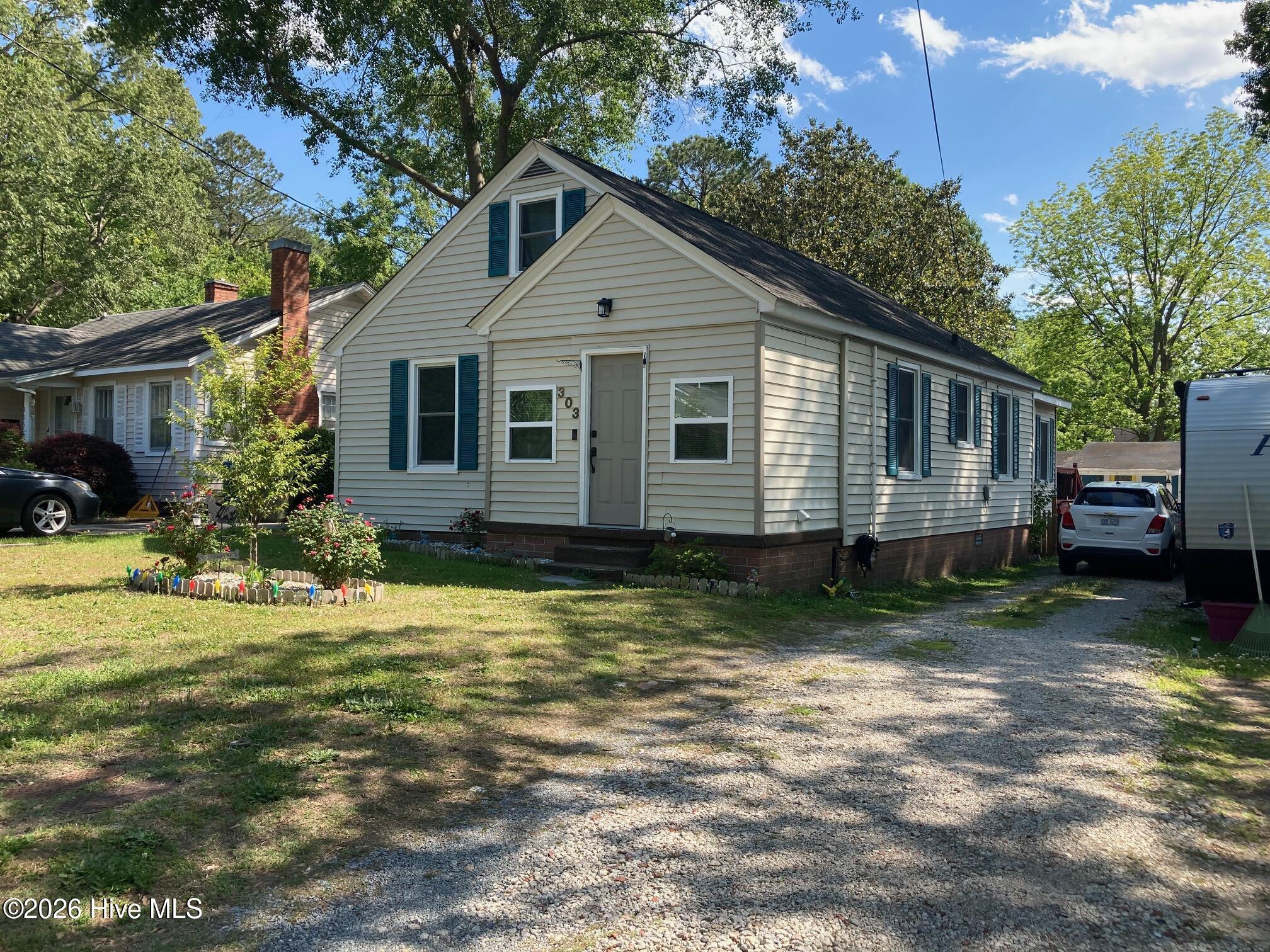 Image 3: Front from Driveway