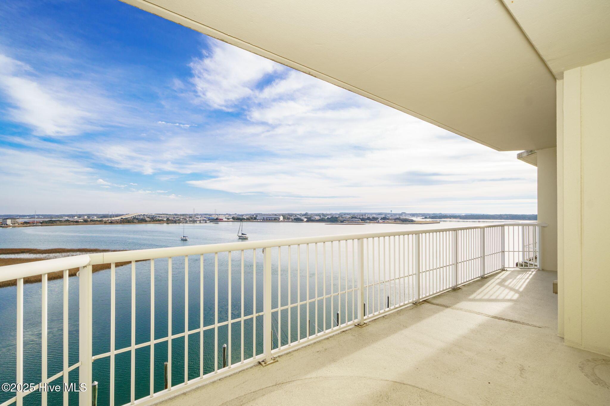 Image 2: Covered porch w/ expansive views