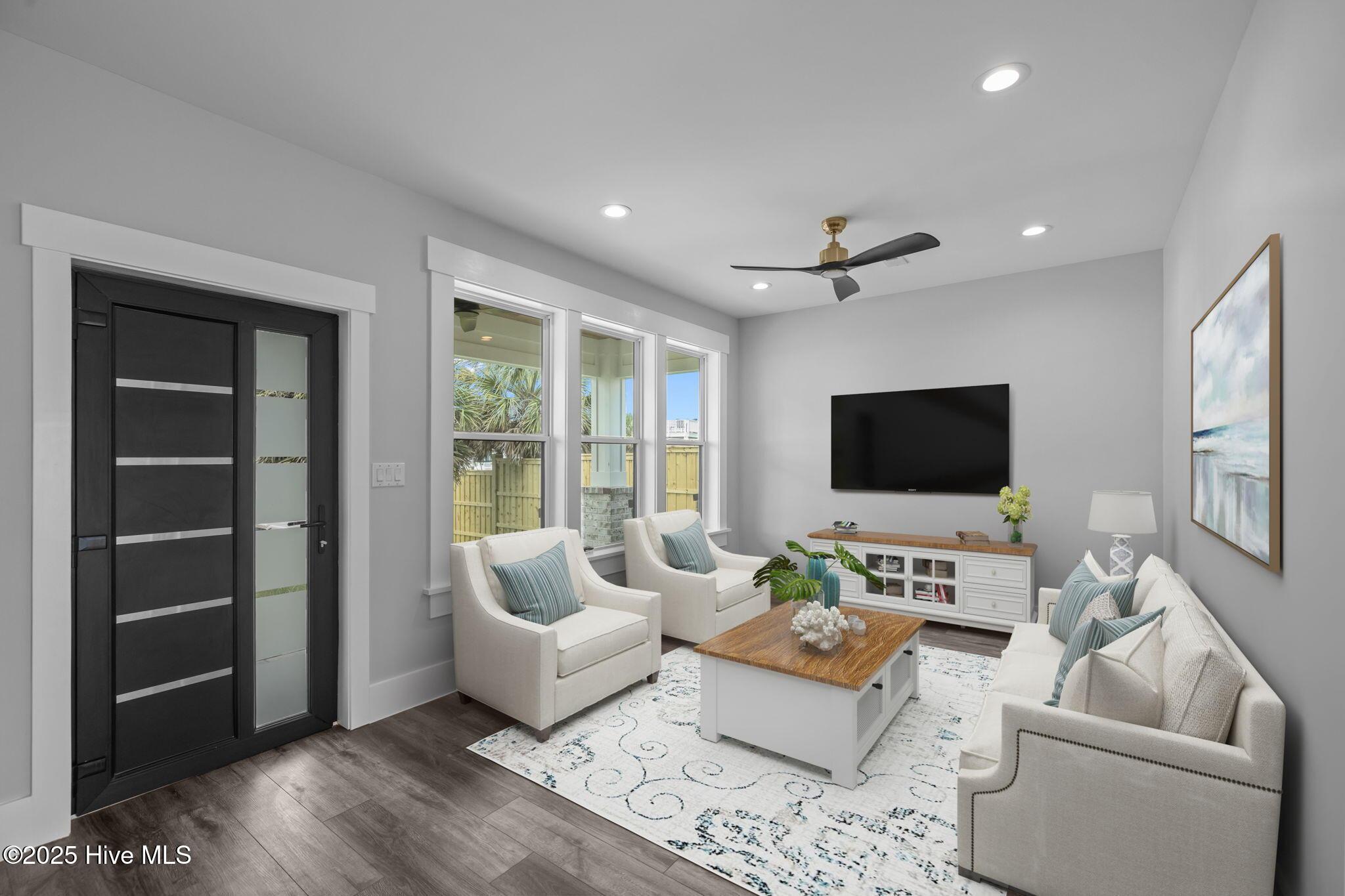 Image 3: Virtual staged lower level family room