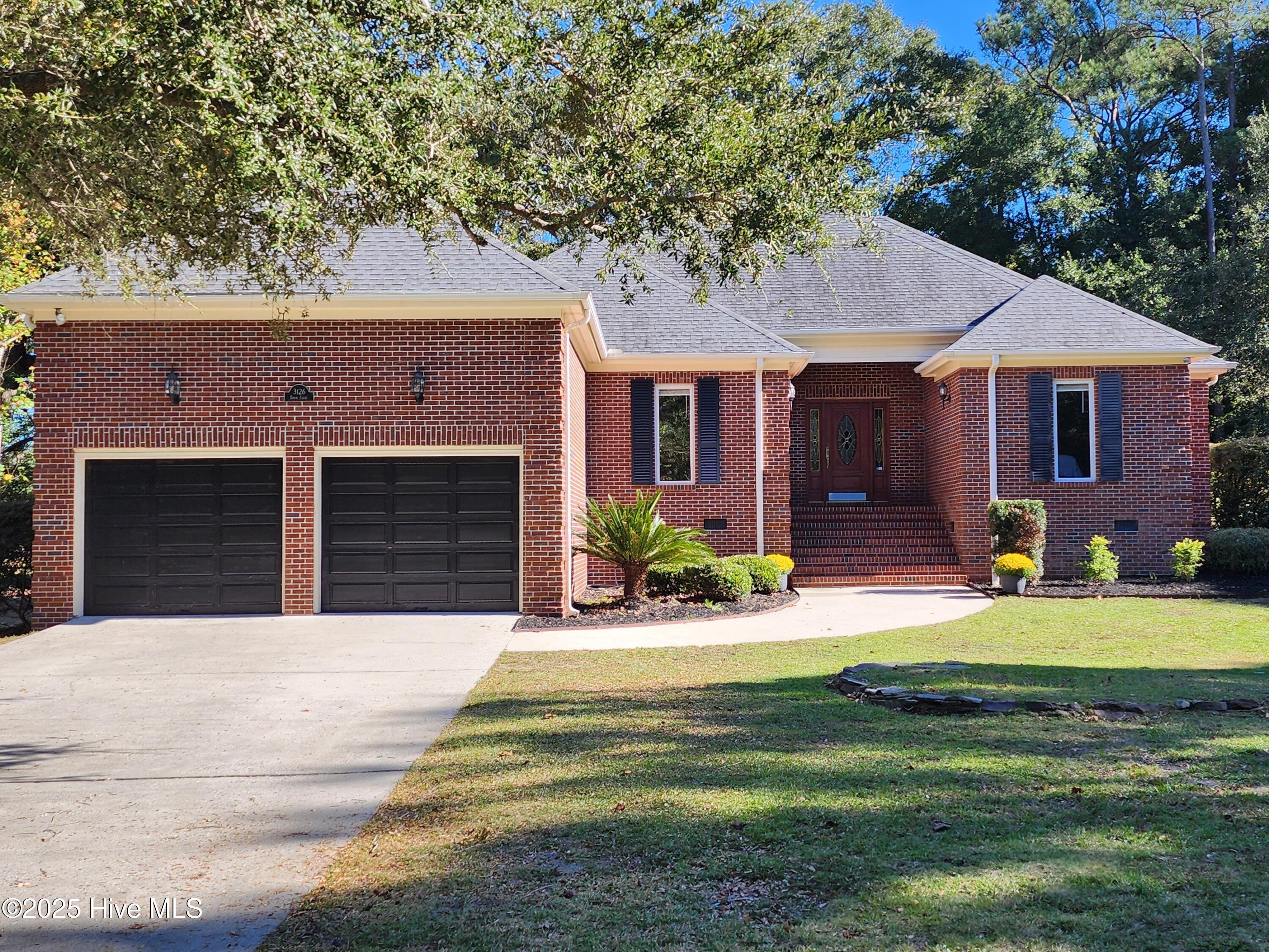 Image 1: 1 level brick ranch