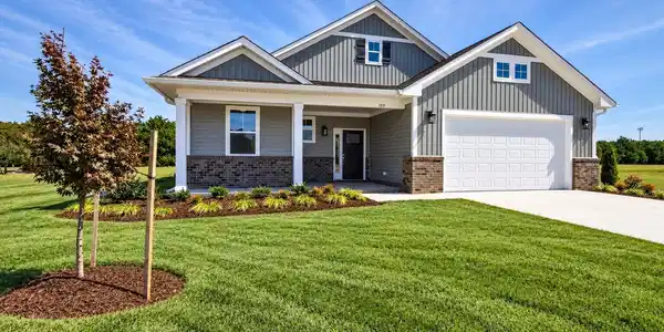 Image 2: Landscaped Craftsman Home Exterior