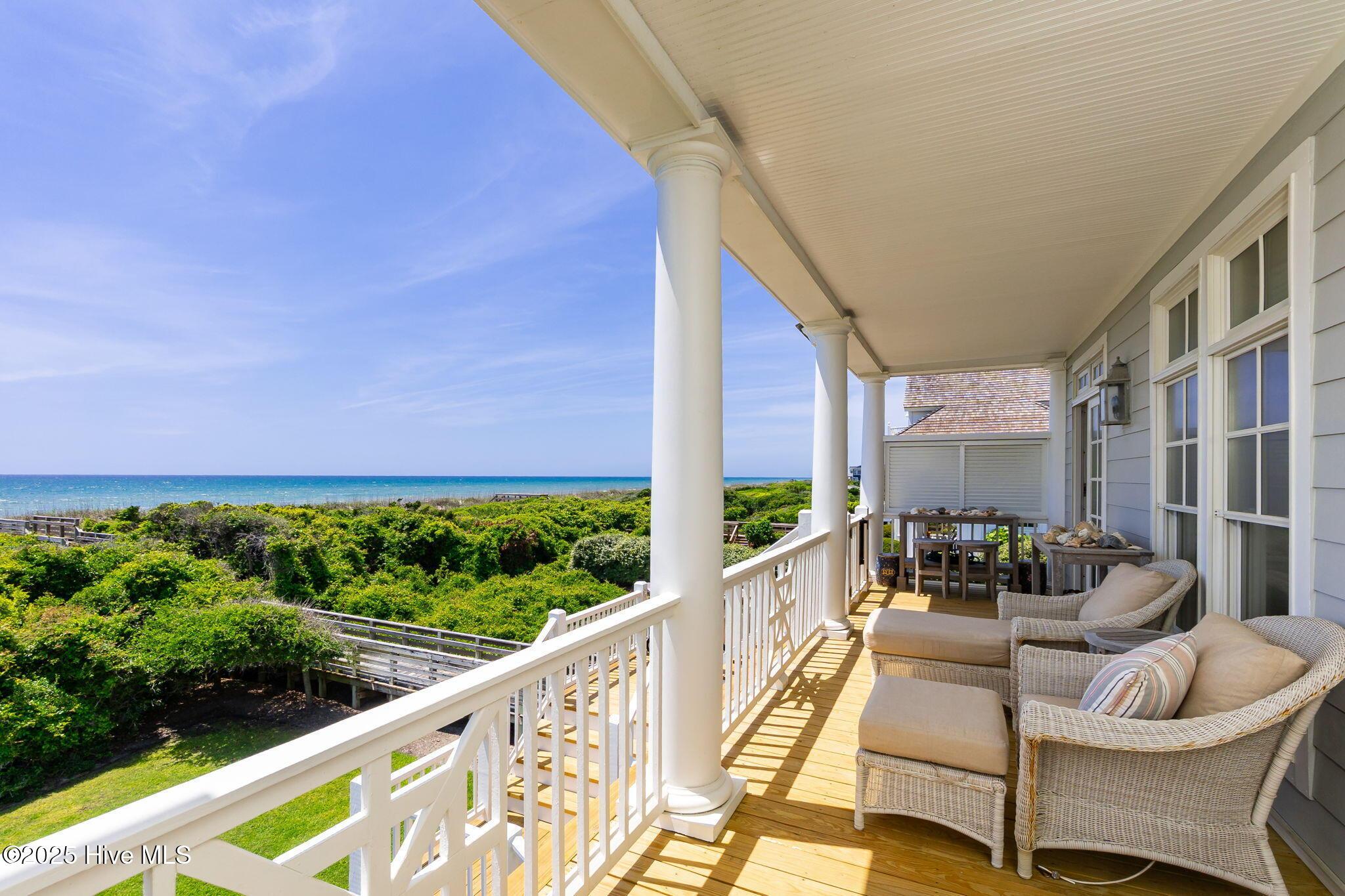 Image 4: Covered porches on ocean side of home