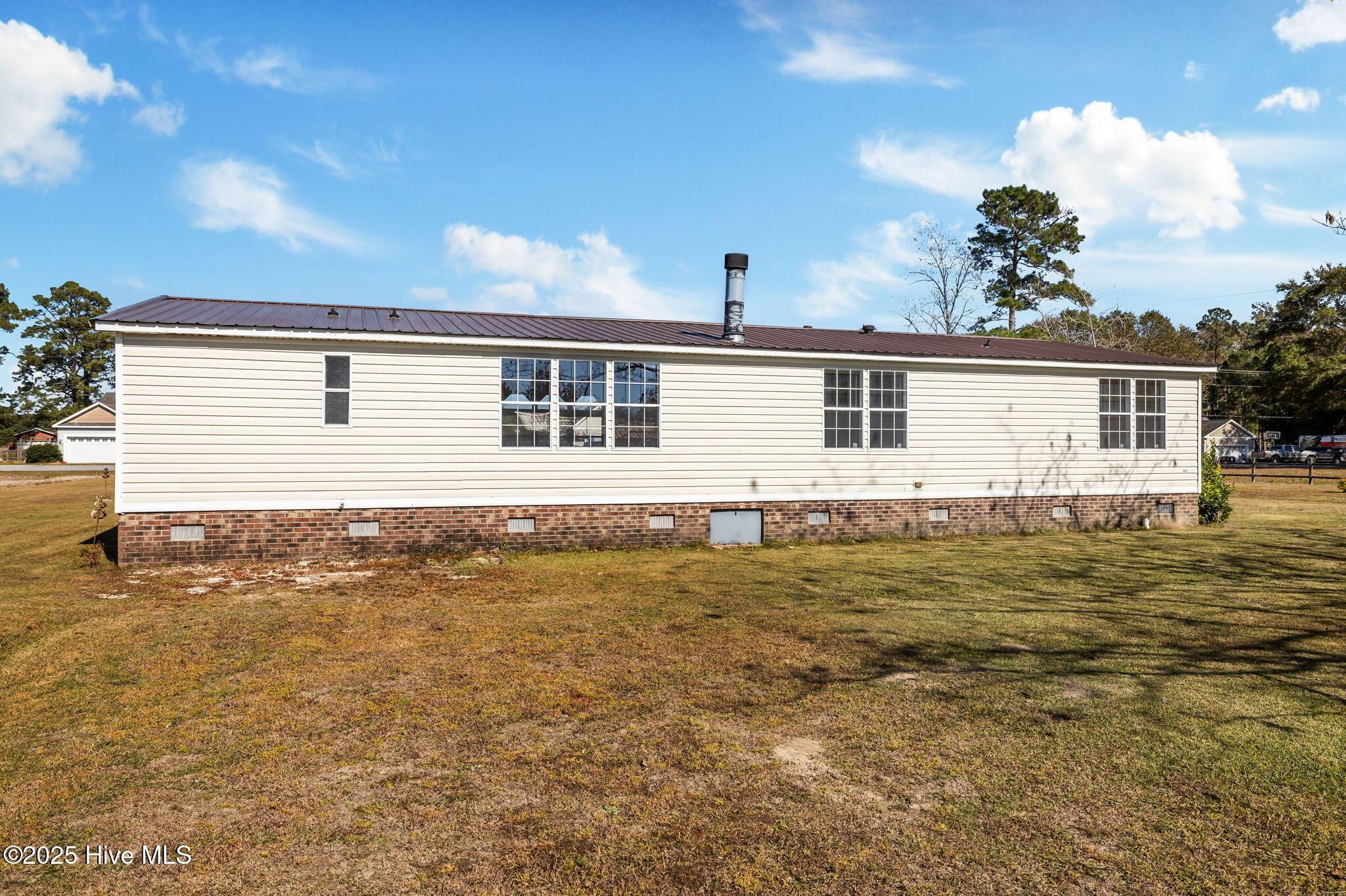Image 2: Back of home
